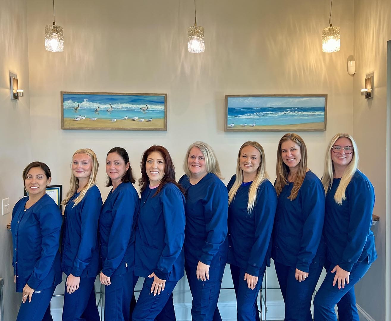 The dental staff of Peripan Dentistry posing together during Christmas time